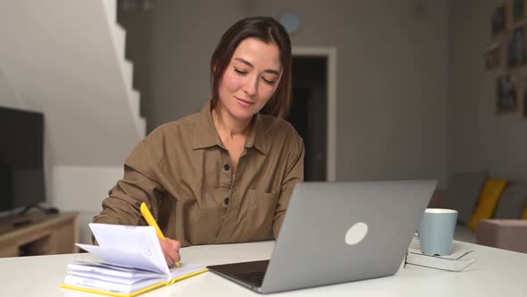 Smiling Kind Young Woman Works From Home