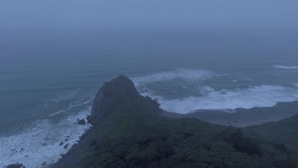 Drone flyig to a high cliff, aerial view of Humboldt Lagoons, California, USA