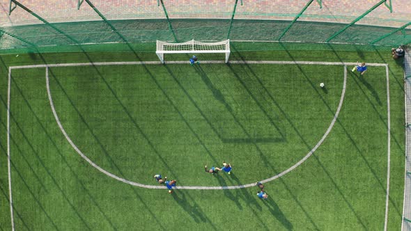 Young Footballers Scoring Goal After Corner Kick