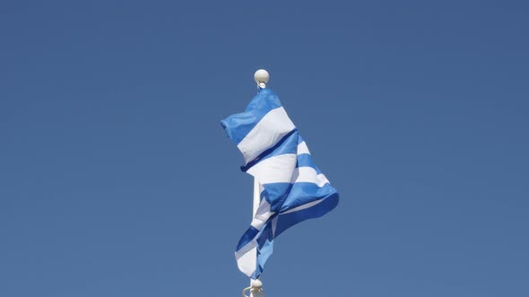 Greek national symbol silky fabric on flagpole 4K 2160p 30fps UHD footage - Flag of Greece against b alt