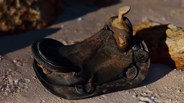 Old Horse Saddle on Sand Beach