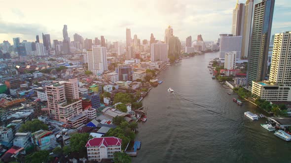 4K UHD : Bangkok River drone view. Flying over the Chao Phraya River