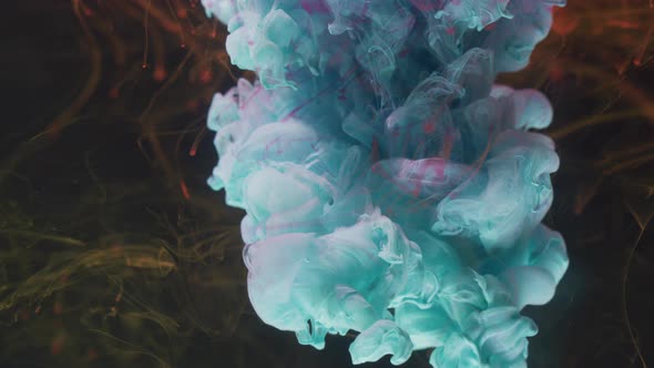 Blue acrylic paint diffusing in water alt