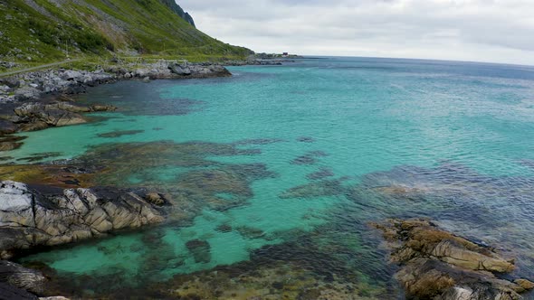 Flying Above a Beach with Clean Turquoise Water in Lofoten Islands Norway
