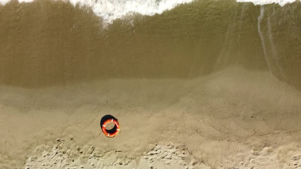 Top View of Lifebuoy in the Sea Shore