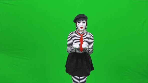 Mime Girl Is Calling Someone, Smiling and Gesticulating. Chroma Key.