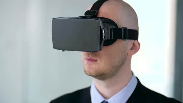 Businessman with Virtual Reality Headset at Office