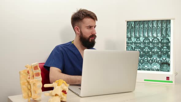 Physiotherapist Writes Down Patient's Symptoms Associated with Back Arm Pain