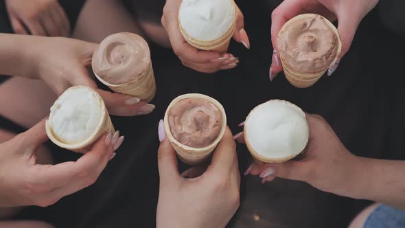 Girls Friends Join Hands with Ice Cream in Waffle Cups in a Circle