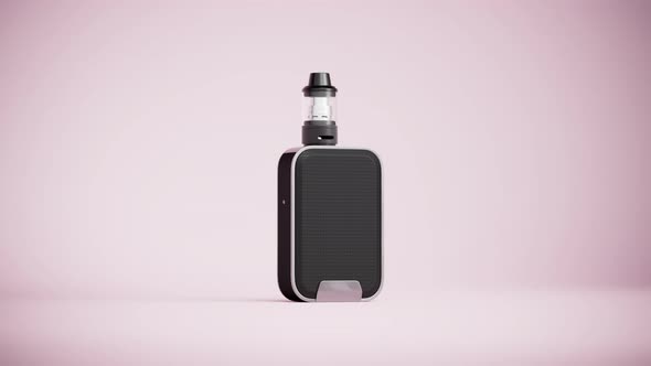 E-cigarette on the pink background. Black electronic cigarette. Quitting tobacco