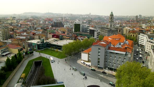 Porto aerial cityscape with City hall in background. Drone lowering above Trindade Metro Station