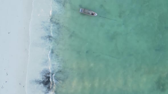 Vertical Video of the Ocean Near the Coast of Zanzibar Tanzania Aerial View