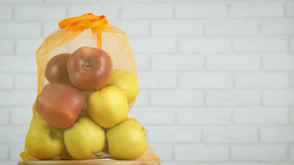 Natural Apples in a String Bag