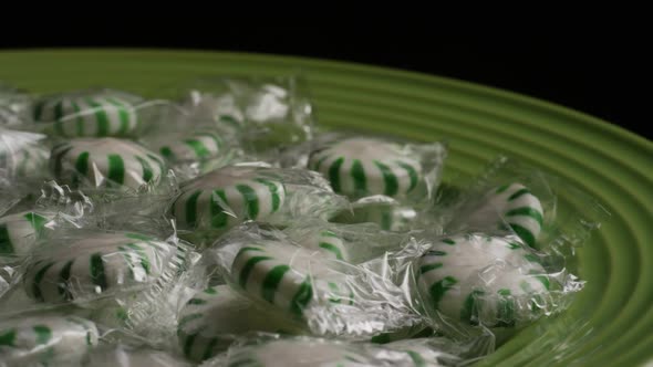 Rotating shot of spearmint hard candies - CANDY SPEARMINT 015