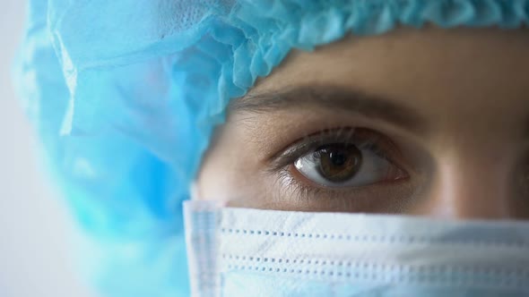 Female Surgeon in Mask Posing for Camera, Confident Look of Professional Doctor