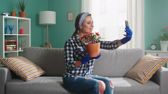 Woman Florist Is Taking Selfie With Beautiful Houseplant