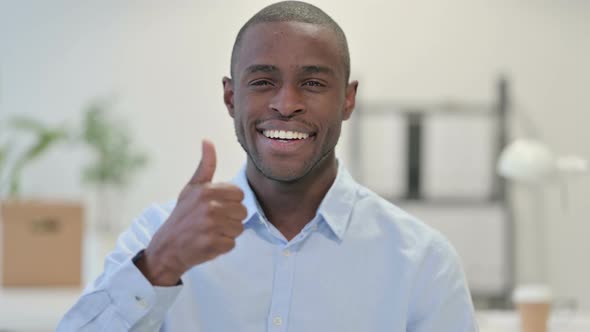 Portrait African Man Showing Thumbs Up Office