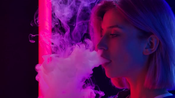 Portrait Young Stylish Woman Smokes Hookah Blows Out Puffs Smoke