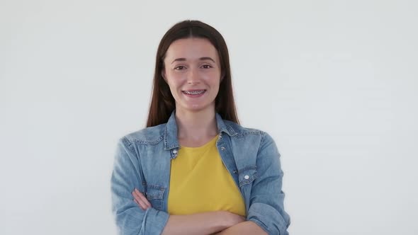 Confident Ukrainian Woman in Yellowblue Clothes Isolated on White Background Smiling Arms Crossed