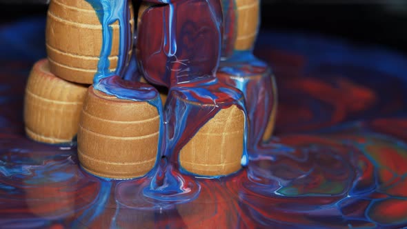 Wooden Barrels Doused with Multicolored Paints