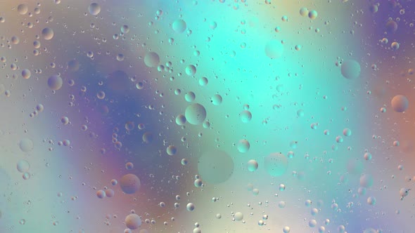 Oil drops on water surface. Abstract colorful macro backdrop