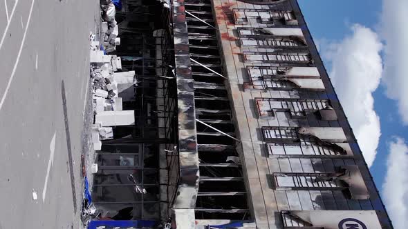 Vertical Video of the War in Ukraine  Destroyed Shop Building in Bucha