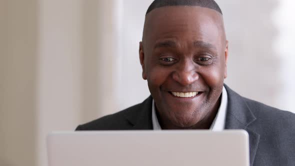 Male Portrait African Mature Businessman Middleaged Employer Afro Entrepreneur Looking at Laptop