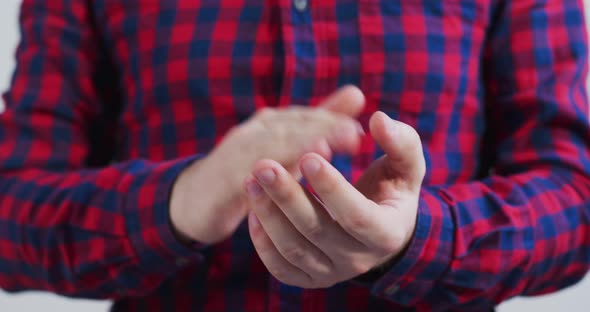 Close up of a man applauding