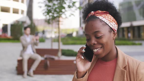  Happy Black Woman Talking on Phone