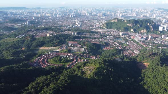 Aerial view housing development near the forest hill