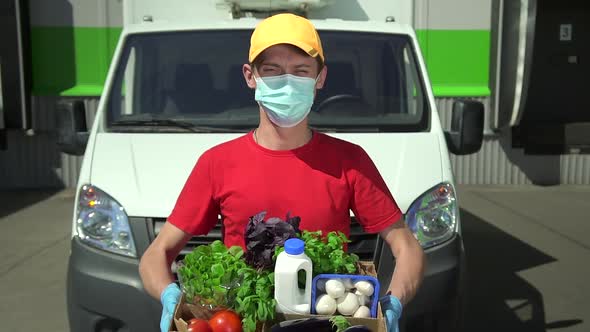 Delivery Man Portrait Stand in Front of Car and Hold Food Spbd