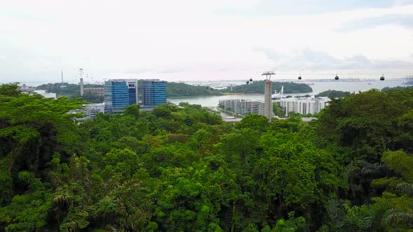 Singapore - There is these small little Sentosa Island. You can go there with bus, train or cable li