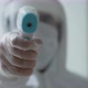 Medical worker measuring temperature - 4k - VideoHive Item for Sale