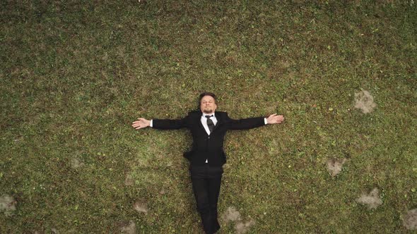 Businessman Lay at Grass Valley