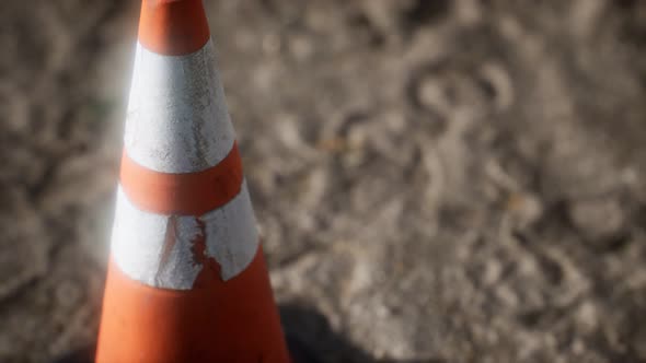 Orange and White Striped Traffic Cone