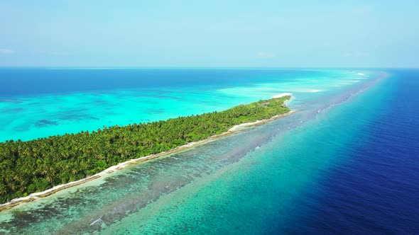 Beautiful flying island view of a sunshine white sandy paradise beach and aqua blue ocean background