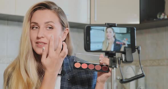 Girl Blogger Makes Video with Makeup Shades Advertisement