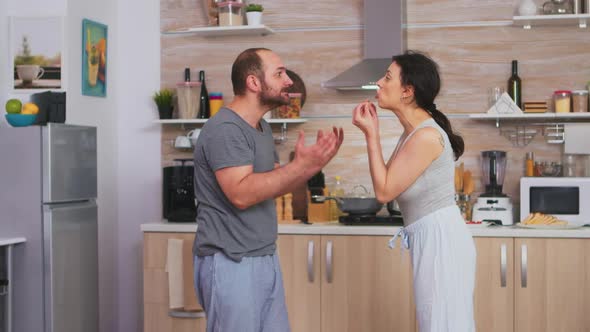 Violent Husband Shaking Wife