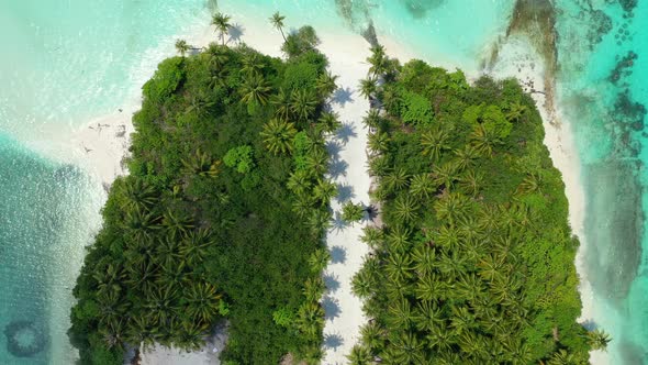 Luxury birds eye travel shot of a summer white paradise sand beach and blue sea background in colorf