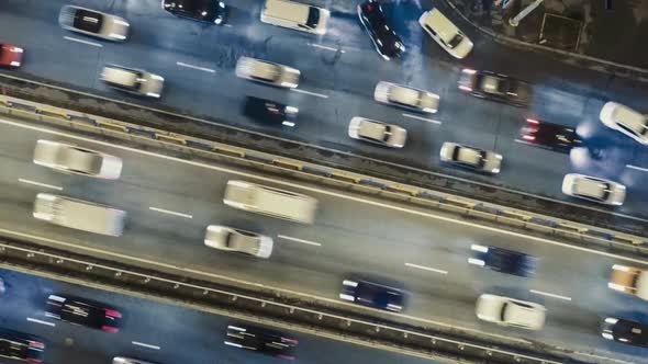 Traffic on Freeway Interchange. Aerial Night View Timelapse City Traffic.