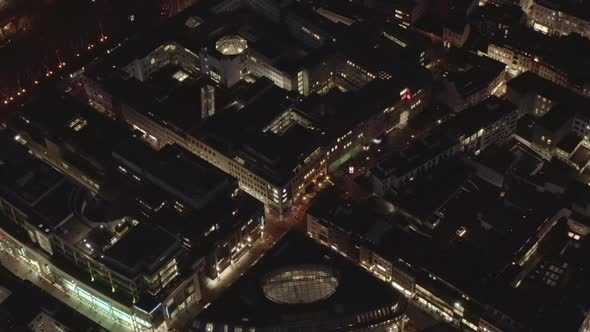 AERIAL: Slow Shot of City at Night, Cologne, Germany 