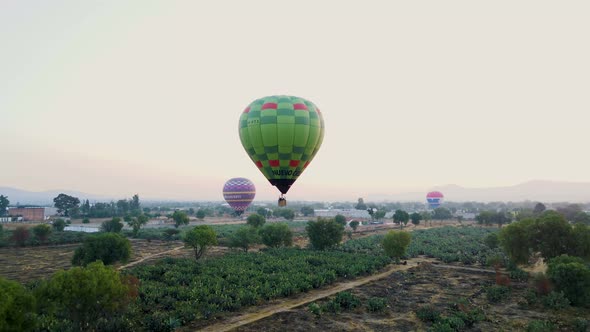 Drone footage hot air balloon flying at morning