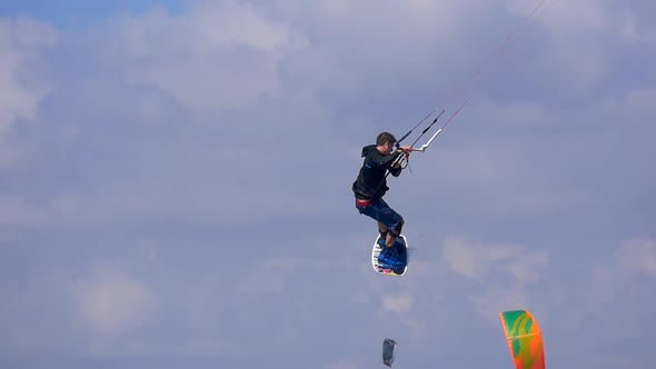 A man kiteboarding on a kite board.