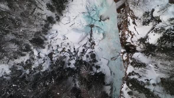 Flying over a frozen waterfall