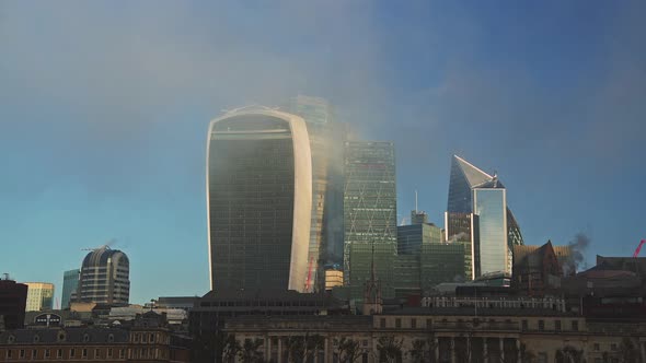 Skyscrapers in Coronavirus Covid-19 lockdown in the City of London in the business area showing Walk