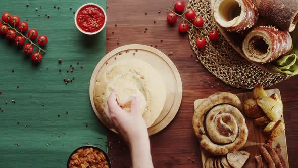 Adding Greenery to Soup in Bread and Top View Putting Smoked Ribs