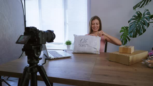 Young Beautiful Woman Leads Her Video Blog From Home