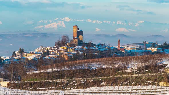 Pan: Italy Piedmont panoramic winter snow view wine yards unique landscape at sunset