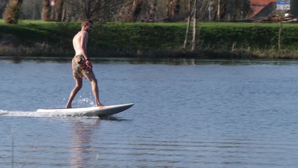 Learning to glide on a foilboard at Europe