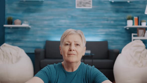 Portrait of Retired Person with Sportswear Looking at Camera